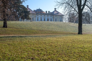 Slavkov Castle view from its park with trees